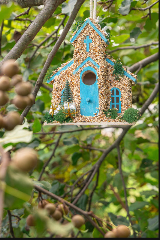 Church with Christmas tree and doves