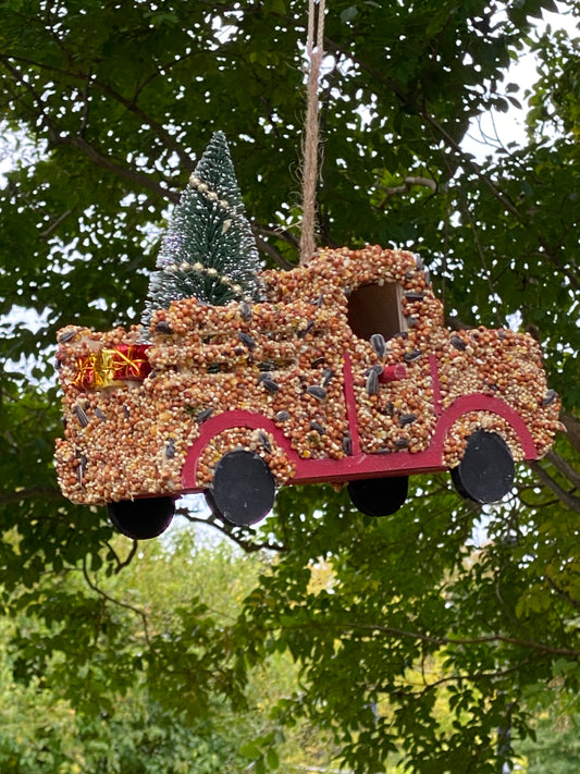 A Red Pick Up Truck with 🎄 Christmas Tree and Presents 🎁