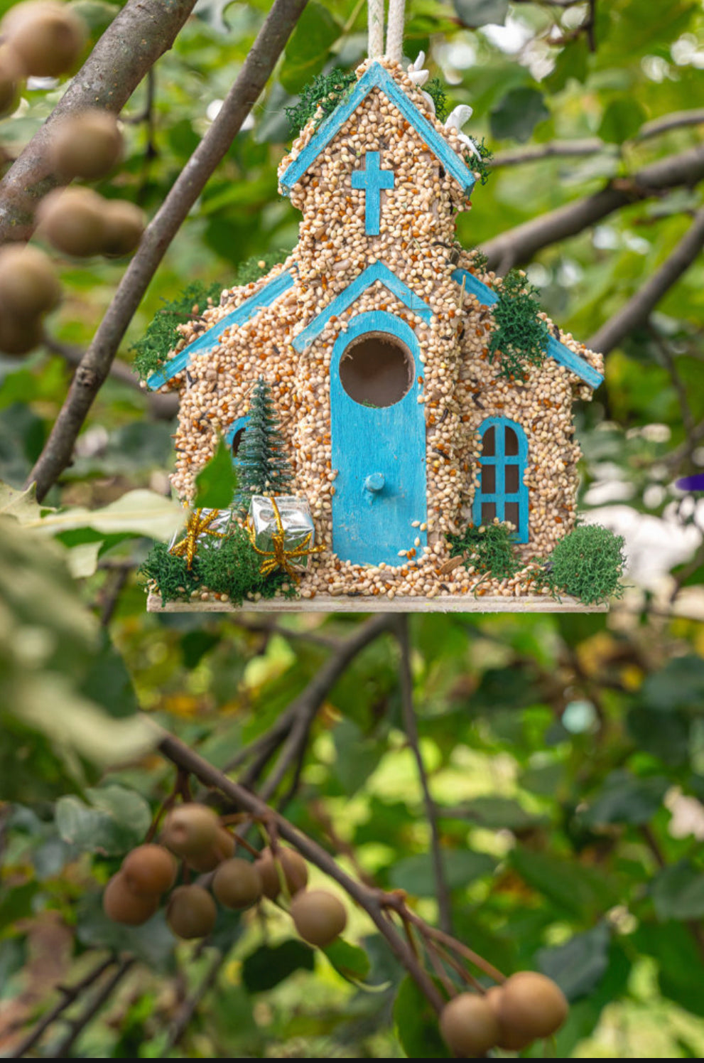 Church with Christmas tree and doves